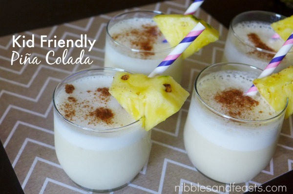 Refreshing Kid-Friendly Piña Colada served in a tall glass with a straw