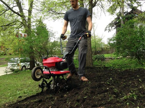 Rototilling the soil for planting